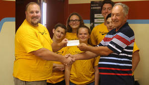 Mr. Andrew Norton receives funds from United Methodist Mens